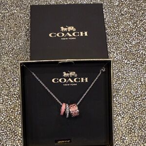 Coach Pink and Silver Pendant Necklace